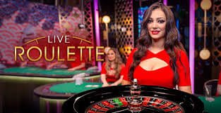 Dealer Andar Bahar di studio menangbet88 mengeluarkan kartu pembuka